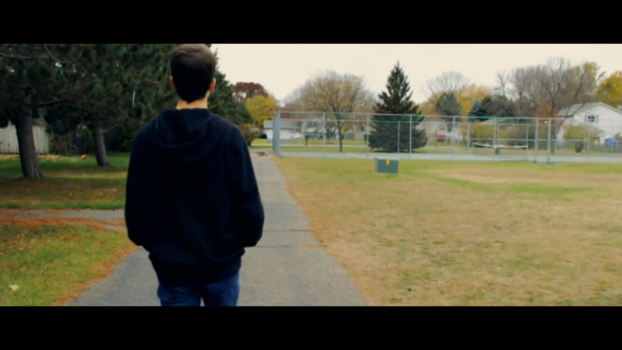 Ethan Z. in Reese Kneelands music video titled: Devotion