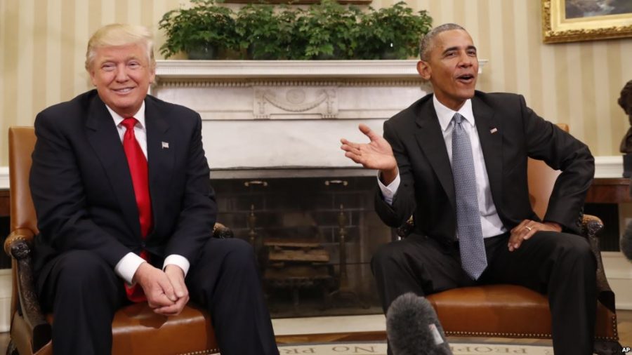 Barack Obama demonstrates how to handle an awkward situation in this encounter with Donald Trump